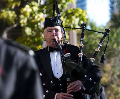 A bagpiper plays at the annual Service of Remembrance