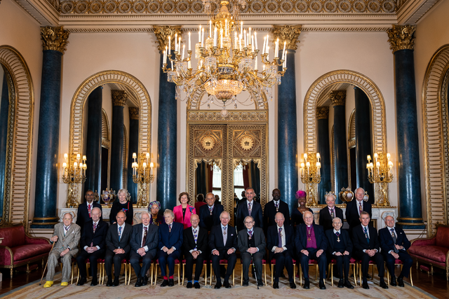 Margaret Macmillan stands with other 2022 recipients of the Order of Merit and King Charles at Buckingham Palace