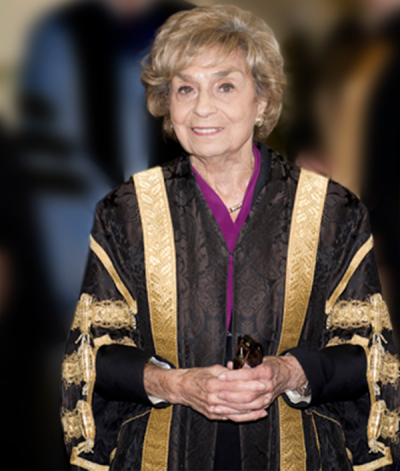 Rose Wolfe in Chancellor robes, smiling