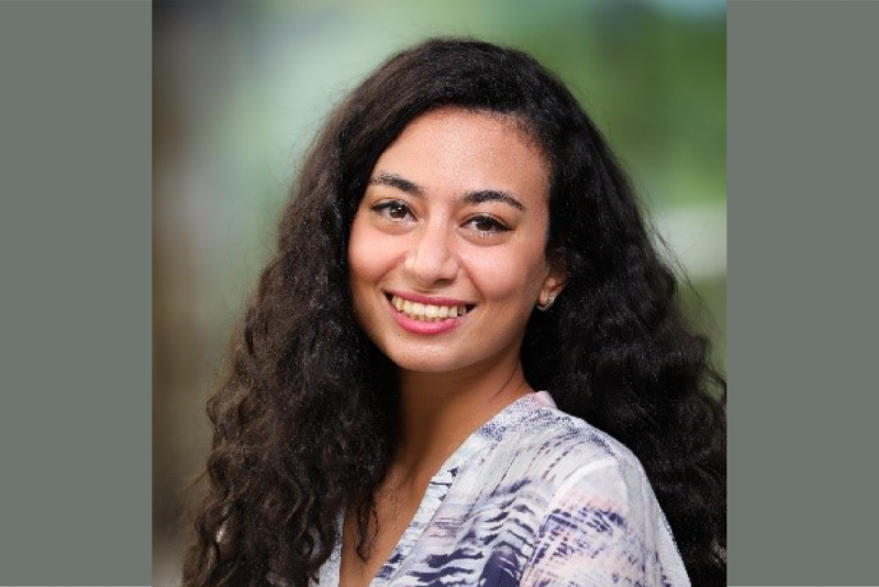 Portrait image of Gina El Kattan smiling.