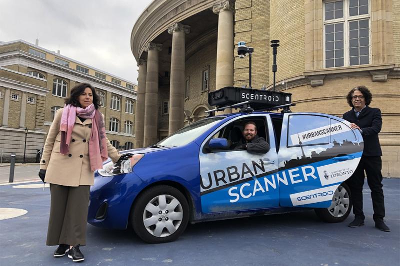 A car parked outside Convocation Hall has the words #UrbanScanner on its side and a tray of equipment on its roofrack.