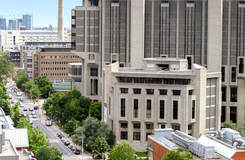 The Claude T. Bissell building sits in front of Robarts Library on leafy St. George Street.