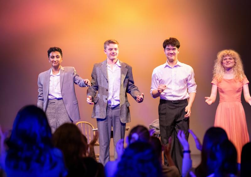 Four students prepare to take a bow on stage at Hart House Theatre drama festival