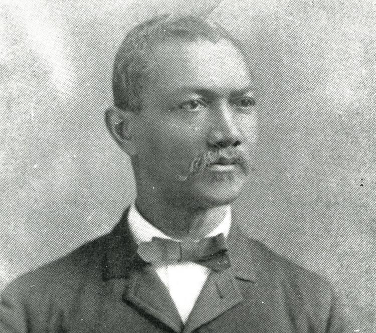 Black and white portrait of Dr. Alexander T. Augusta looking solemnly into distance