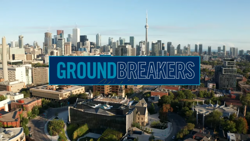 The word groundbreakers is superimposed across an aeriel view of One Spadina and the U of T campus.
