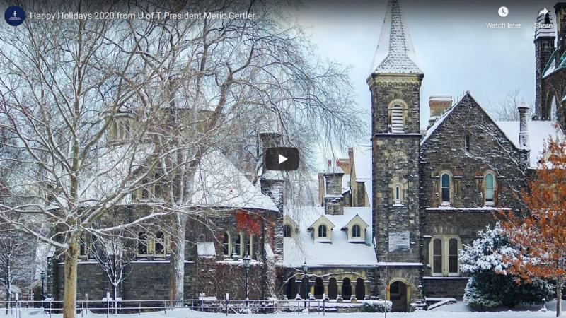 Snow lies on roofs and tree branches outside Croft Chapter House in this still from the holiday video.