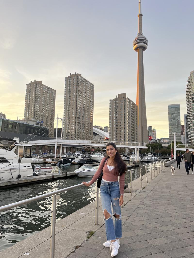 Sera standing with the CN Tower in the background