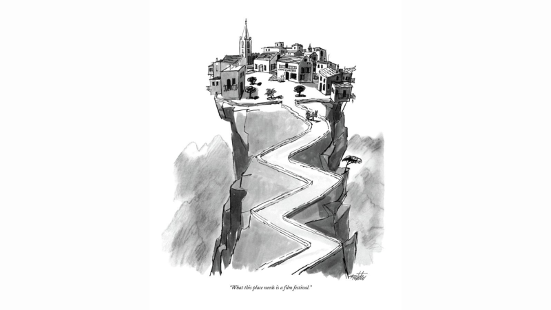 Black and white image of a road leading to a city on a cliff. 