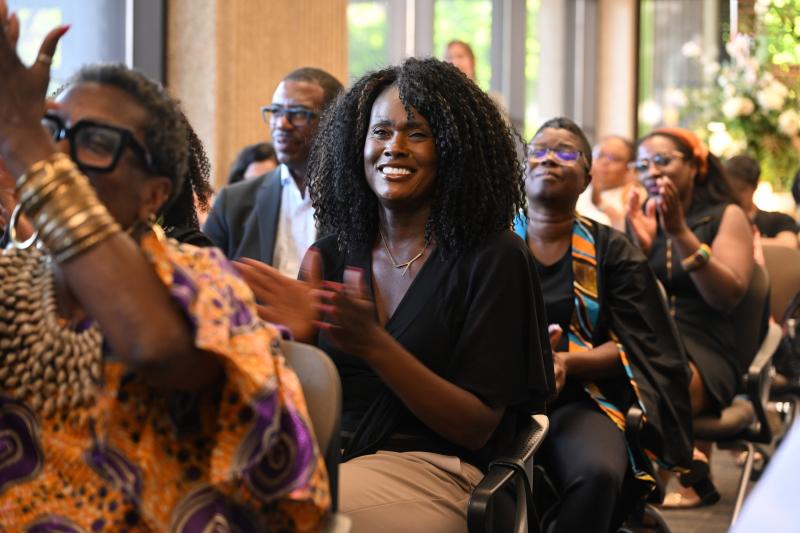 Image of women clapping.