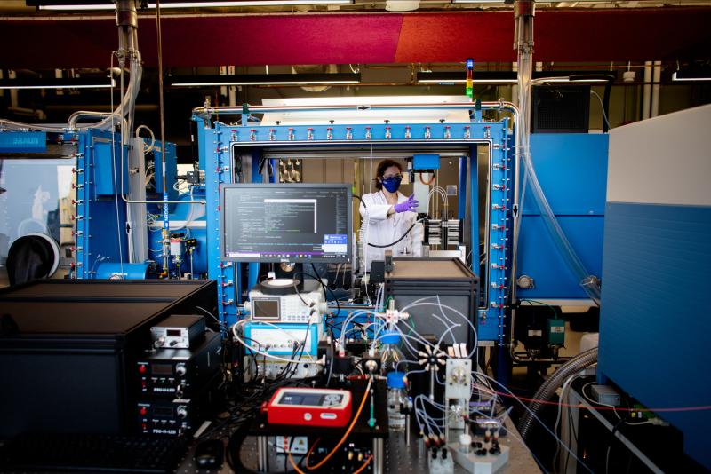 Image of researcher in a lab with computers