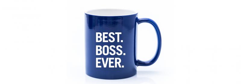 Blue coffee mug with the words "Best. Boss. Ever." written in large, block letters.