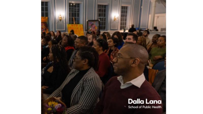 People sitting and watching an award show