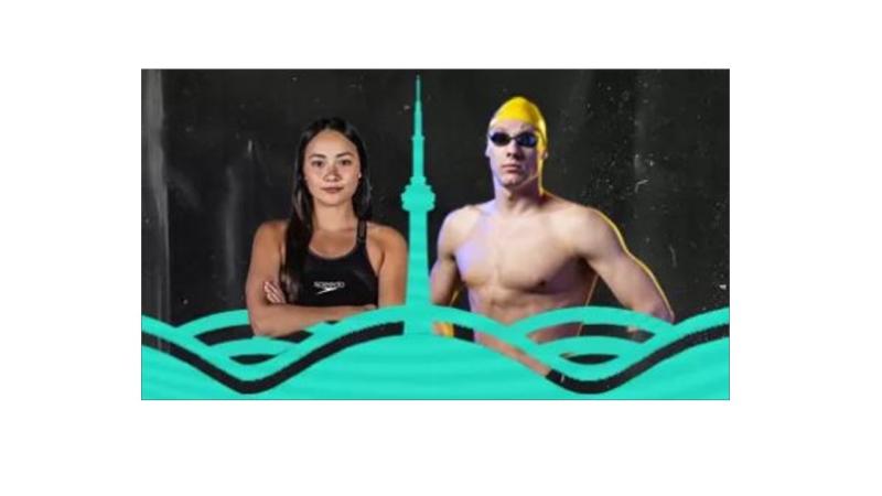 Two swimmers standing together.