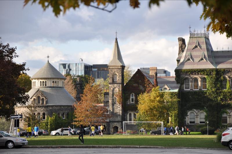 Panoroma photo of University of Toronto Front Campus in the fall, with University College in the background.