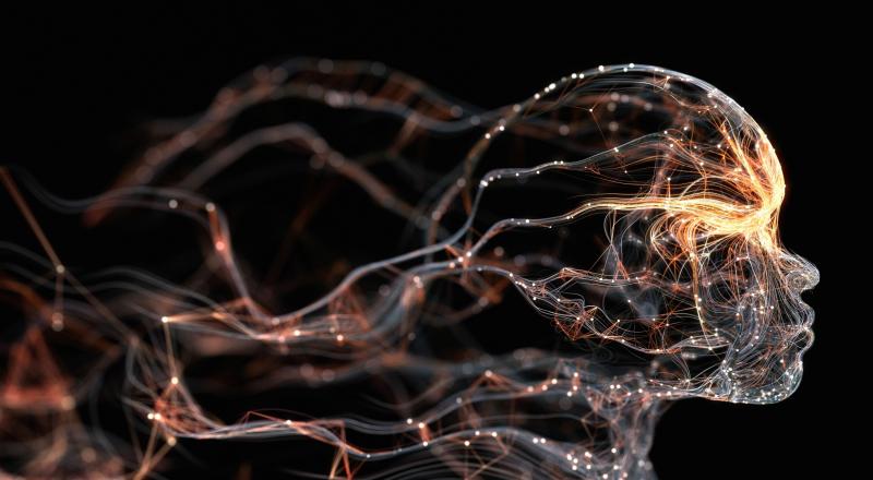 Image of a futuristic skull in profile outlined in fibre optic cables