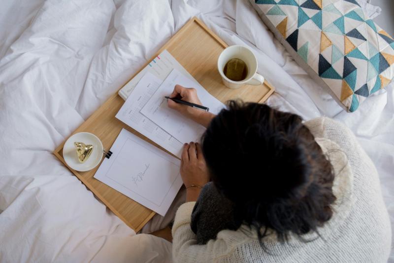 person studying on their room.
