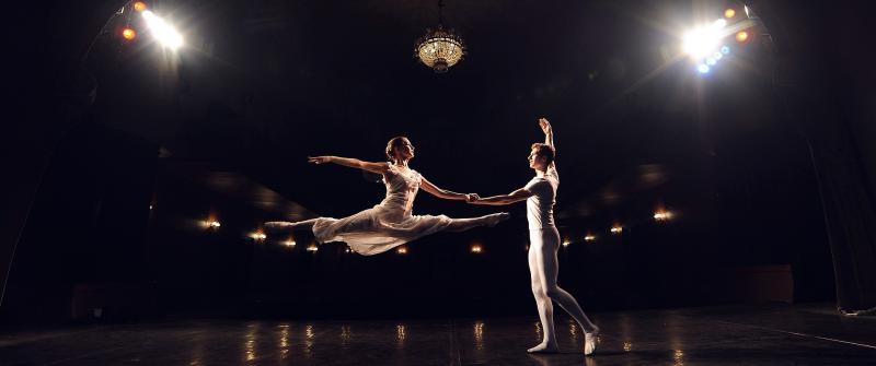 A ballet performance featuring a woman and a man