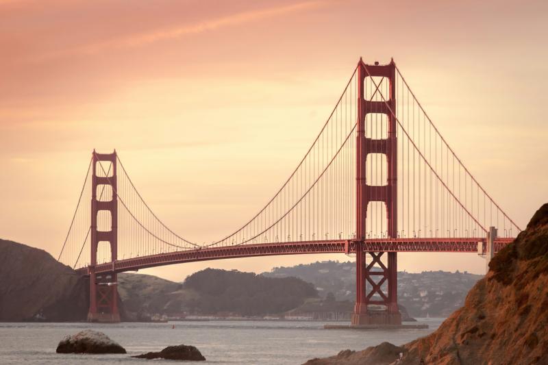 The Golden Gate Bridge in San Francisco at sunrise.
