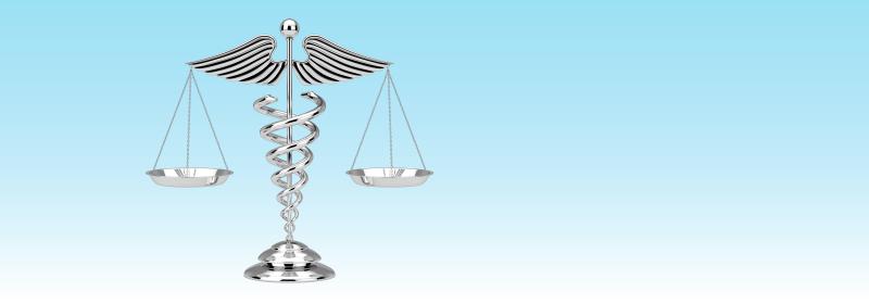 Medical symbol with balanced scales