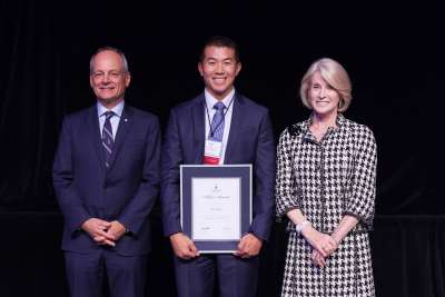 A 2018 winner holding his Arbor Award