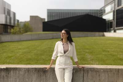 Thaisa stands outside at the UTM campus