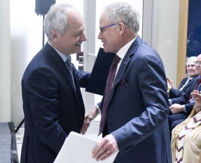 U of T President Meric Gertler greets Bruce Kidd (photo by Ken Jones)