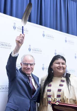 U of T Scarborough Traditional Elder Wendy Phillips presented Bruce Kidd with an Eagle feather