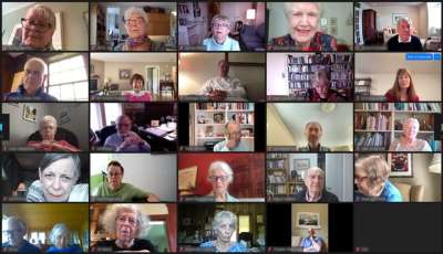 Screenshot: the Class of 1962 chat with each other from their homes on a group video call.