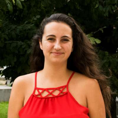 Portrait of Alienor Rougeot-Martinez smiling.