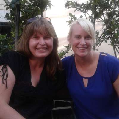 Camilla Urbaniak with NASA astronaut Kate Rubins, both smiling.