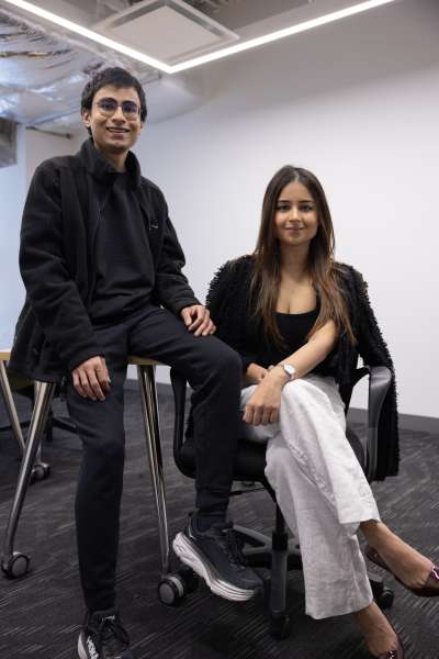 A portrait of Aryaman (left) and Athiya Rastogi sitting on a chair.