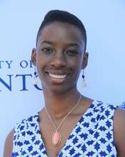 Portrait photo of Janelle Joseph smiling