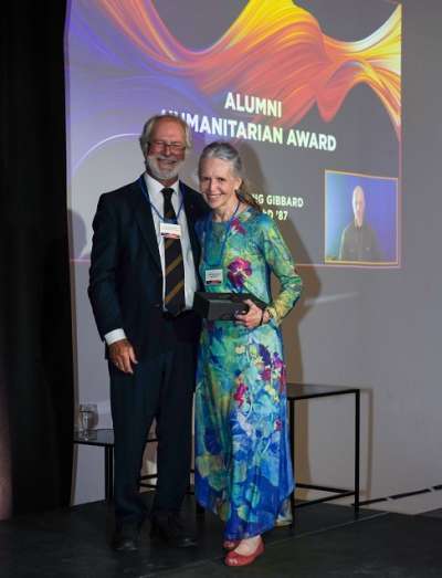 Leslie Laing on stage accepting an award 