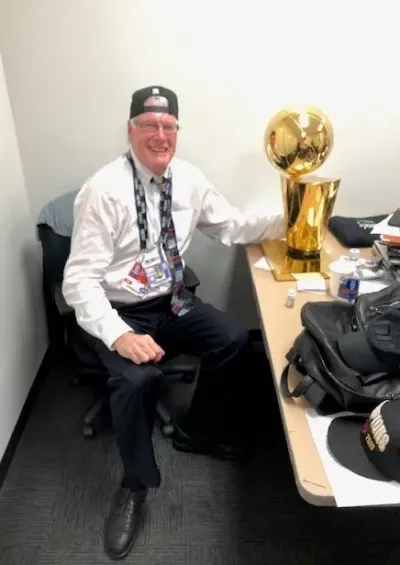 Brian posing with the Raptors' trophy