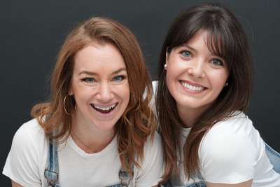 Two women posing for the camera