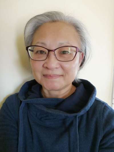 Portrait image of Doris Chee smiling.