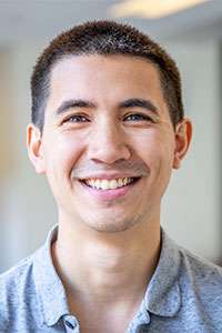 Portrait image of Javier Romualdez smiling.