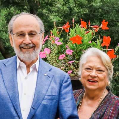 James and Louise Temerty pictured outside and smiling