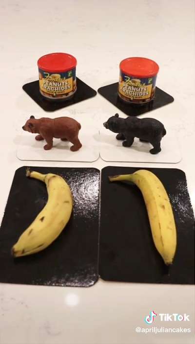 3 cakes next to the objects they look like exactly. A tin of peanuts, a toy plastic bear, a ripe banana. 