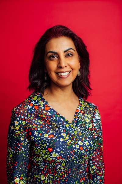 Portrait of Zarqa Nawaz smiling