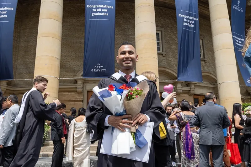 Javiet in front of Convocation Hall
