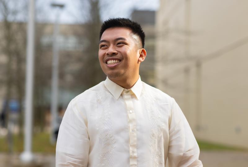 Close-up of Alfonso Ralph Mendoza Manalo smiling outside.
