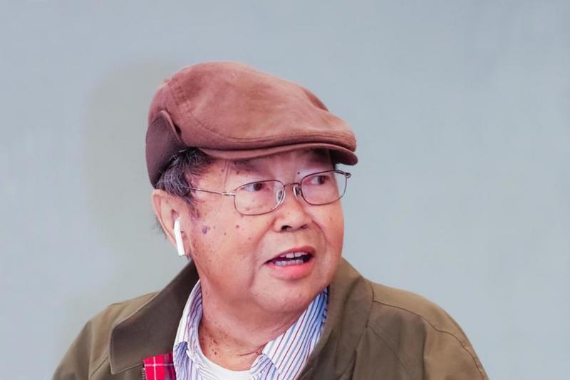 Choong Chin Liew, known as C.C., looks startled as he looks to his left.