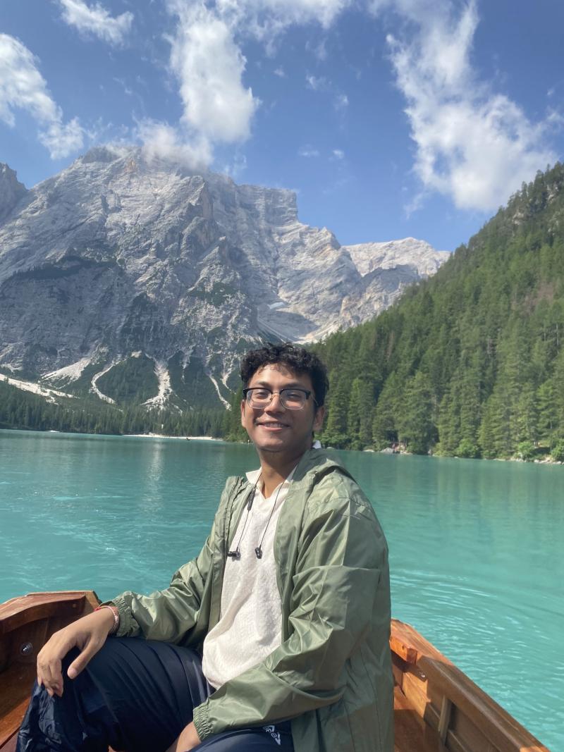 Abidur Rahman in a boat on a lake