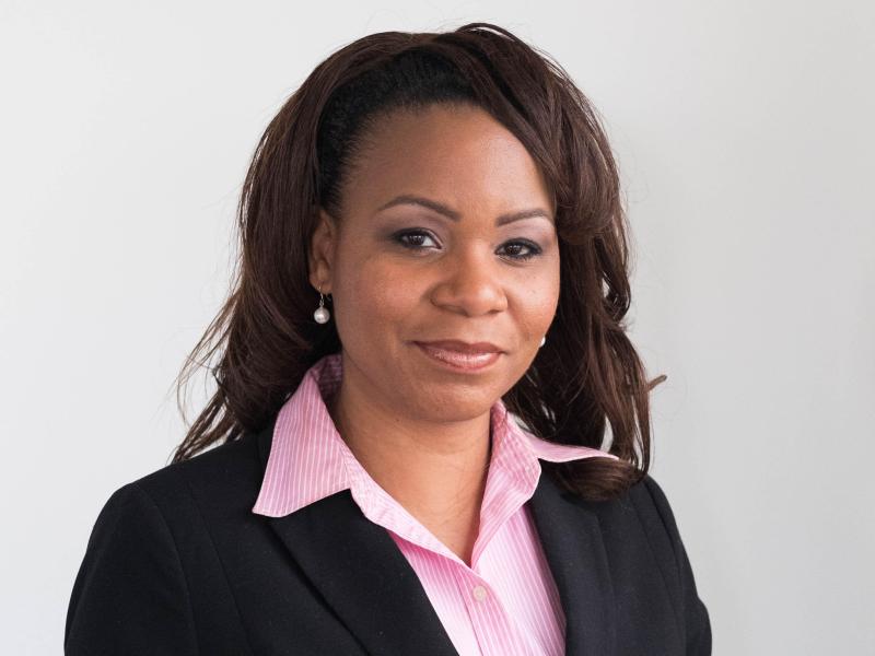 Portrait of Chrystal Smith smiling.