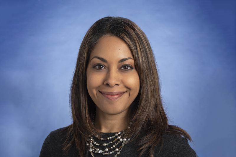 Portrait of Susy Hota smiling
