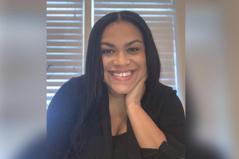 Portrait of Krysta Cooke smiling.