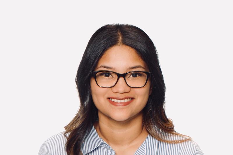 Portrait of Nadine Narain smiling.