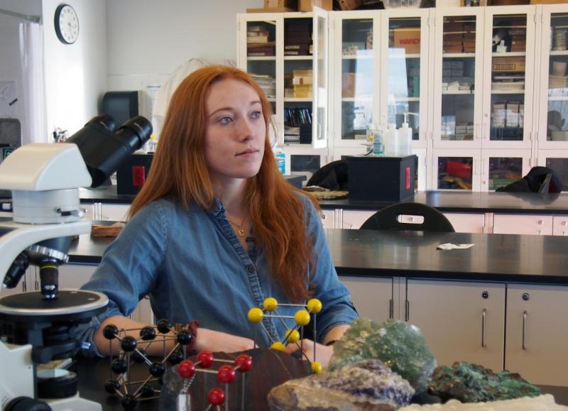 Charlotte Wargniez sitting in a science lab