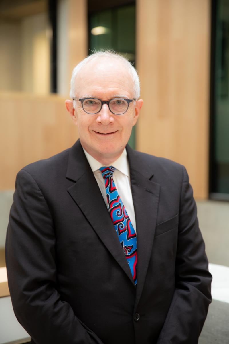 Head shot of Paul Cadario wearing a suit